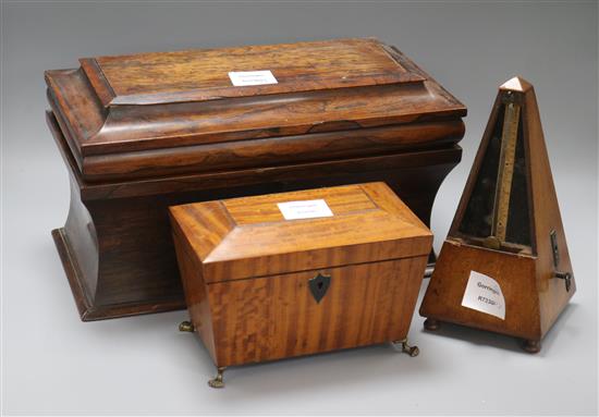 Two Victorian tea caddies, one rosewood and one satinwood, together with a Victorian metronome longest 35.5cm